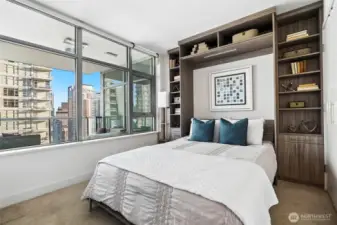 Wonderful guest suite with custom built-in Murphy Bed with additional shelving & storage, so cool!