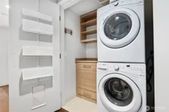 Check out the laundry closet with efficient storage.