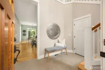 The bright, double story entryway invites you in.