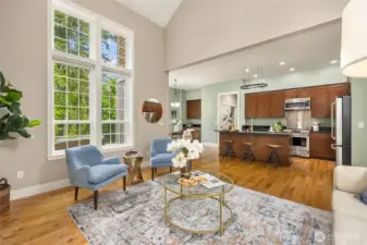 With beautiful birch floors throughout the open floorplan living-kitchen-dining areas, the home is warm and sunlit.