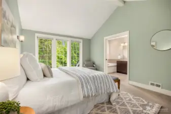 Spacious and bright, the primary provides space to retreat.