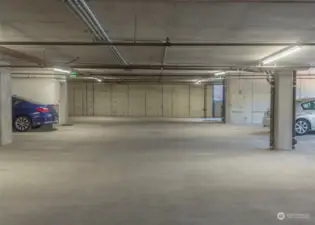 Unit 402 has two parking spaces and a large storage unit in the secure garage.