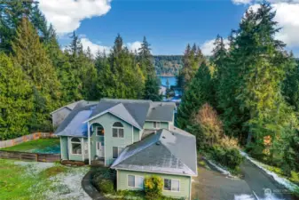 This stunning NW Contemporary two-story Illahee home, offering partial water views, is the one you've been dreaming of!