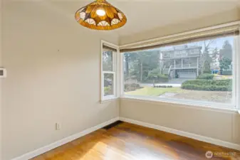 Stained glass chandelier graces the dining room