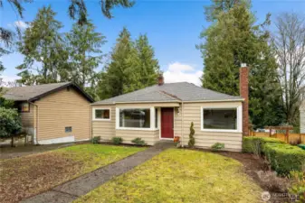 Ample parking for several vehicles in driveway to left of home