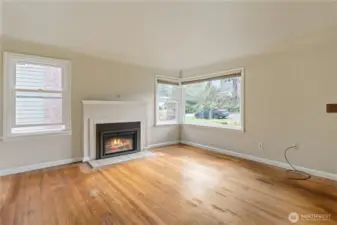 Huge windows in the living room make a light and bright entry to the home