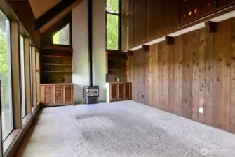 Vaulted tongue & groove ceiling in the living, gas fireplace creates a nice ambience.