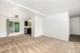 Open main living room flows into the dining room.