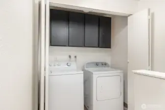 Conveniently located upstairs laundry area for easy access and efficiency.