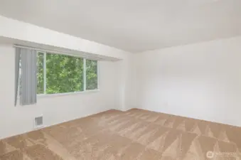 Another view of the primary bedroom.