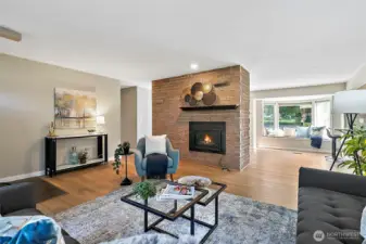 Dual sided fireplace -- living room is gas.   On the other side is the dining room where it is wood!