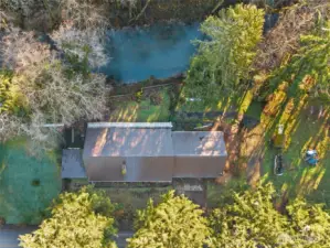 Neighboring property to left, creek at top