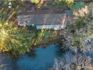 Ariel Overview.  Road is at the top of photo.  Back view and creek