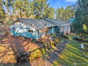 Nice views of creek from upper deck.  Room for garden boxes, sitting area  at end of home