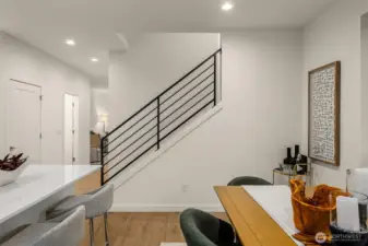 Wrought iron railings add an additional layer of luxury to the kitchen