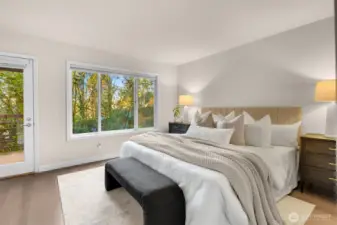 Primary with private access to one of the balconies.