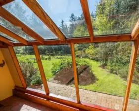View toward the pond from greenhouse