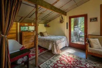 Studio tub and sleeping area