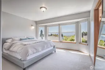 Primary bedroom with big windows