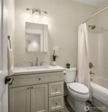 Stylish full bath in the 2nd bedroom suite.