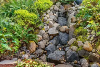 Relax by the soothing sounds of your own backyard water feature.