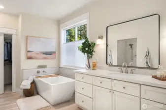 The second vanity includes extra storage space.