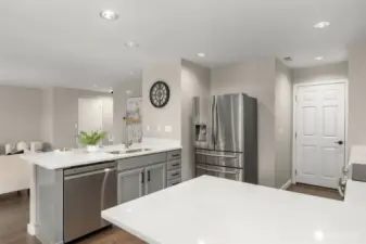 The door leads to the garage  ... easy access to the kitchen when you bring in your groceries in!