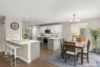 Another view of the dining area and kitchen.