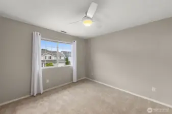 1st secondary bedroom is large and bright.