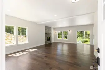Welcoming open floor plan with engineered wood floors throughout.