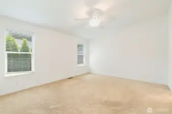 Large Primary bedroom en suite with walk-in closet.