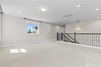 Super-Sized, Versatile Family Room Provides Ample Space for Entertainment or Relaxation.
