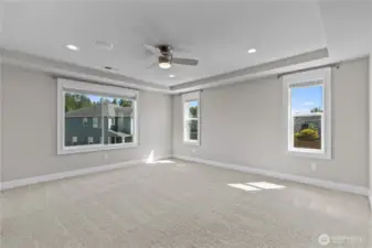 Primary Suite Features Coved Ceiling, Fan-Light and Abundant Room to Relax and Sleep Well.