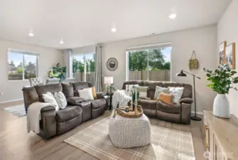 Open concept living and dining area with lots of natural light