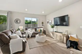 Open concept living and dining area with lots of natural light