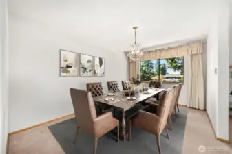 large Formal dining room flows easily to kitchen or living room  (virtually staged)
