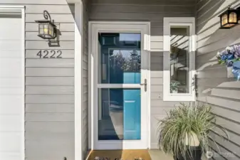 Welcoming front door - building recently re-sided and painted!