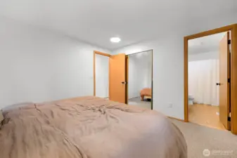 Primary bedroom with attached bathroom