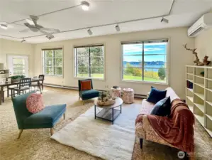 4403...Another view of the formal rooms....the west facing picture windows bring in so much natural light and views of beautiful sunsets.