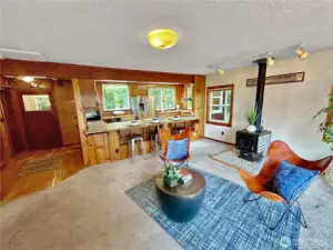 4403...Another family room view.  Here we see the access from the front of the house, eating bar and open kitchen.