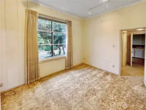 4403...Main floor den or overflow guest space with easy access to full, main floor bath.