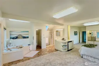 4403...Primary bath with soaking tub, sky lighted shower stall and double vanities.