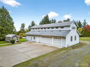 Detached garage with electric door openers, office space and full bath.