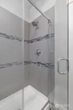 This shower has gorgeous tile work and is nicely sized.