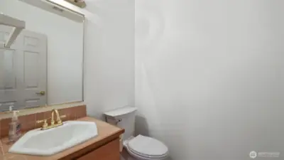 Nice half bath powder room for guests.