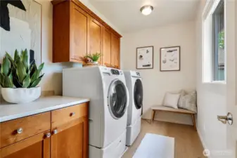 A spacious, high-end washer and dryer set that effortlessly combines luxury with functionality.