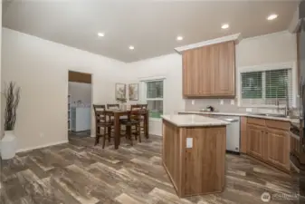 Lots of space to gather in this kitchen which is the hub of the home!
