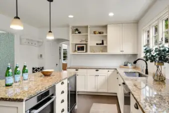 Expansive eat-in kitchen equipped with new appliances.
