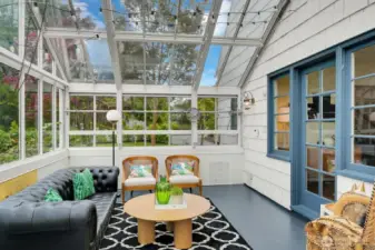 Incredible conservatory is a lovely addition to this gorgeous home. Pre-plumbed gas line for a gas fireplace. Ceiling canters open and is an operable greenhouse.