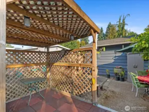 The pergola is perfect for socializing or enjoying the quiet of the backyard.
